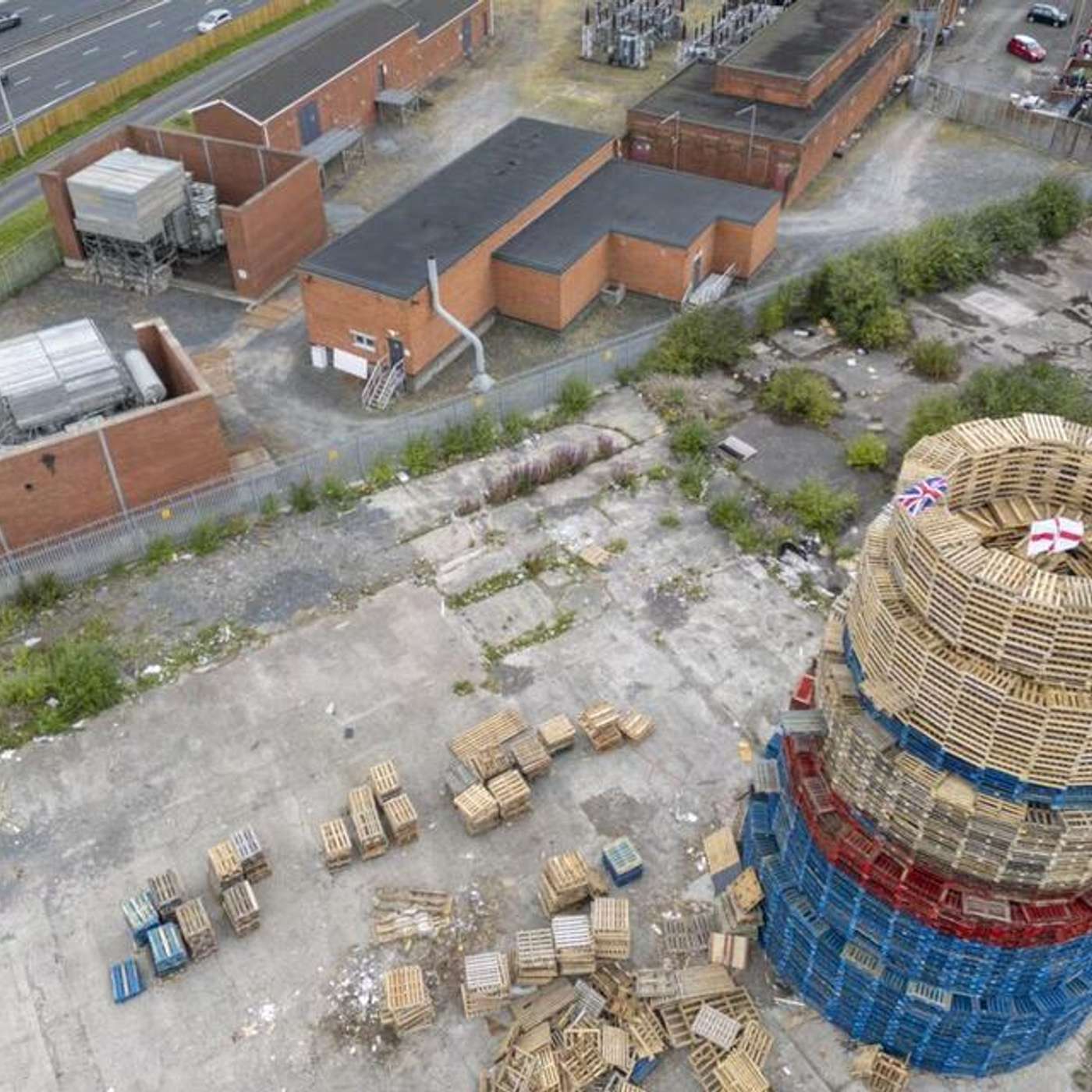 Four Arrested in UK Cyberattack, Belfast Bonfire Sparks Controversy, Kneecap's Wembley Poster Rejected, Scotland Prepares for Trump Visit, and more... episode artwork