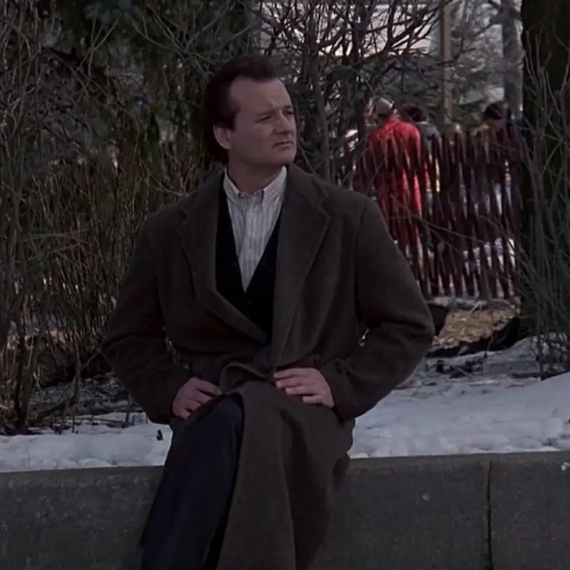 a gust of wind. a dog barks. cue the truck.