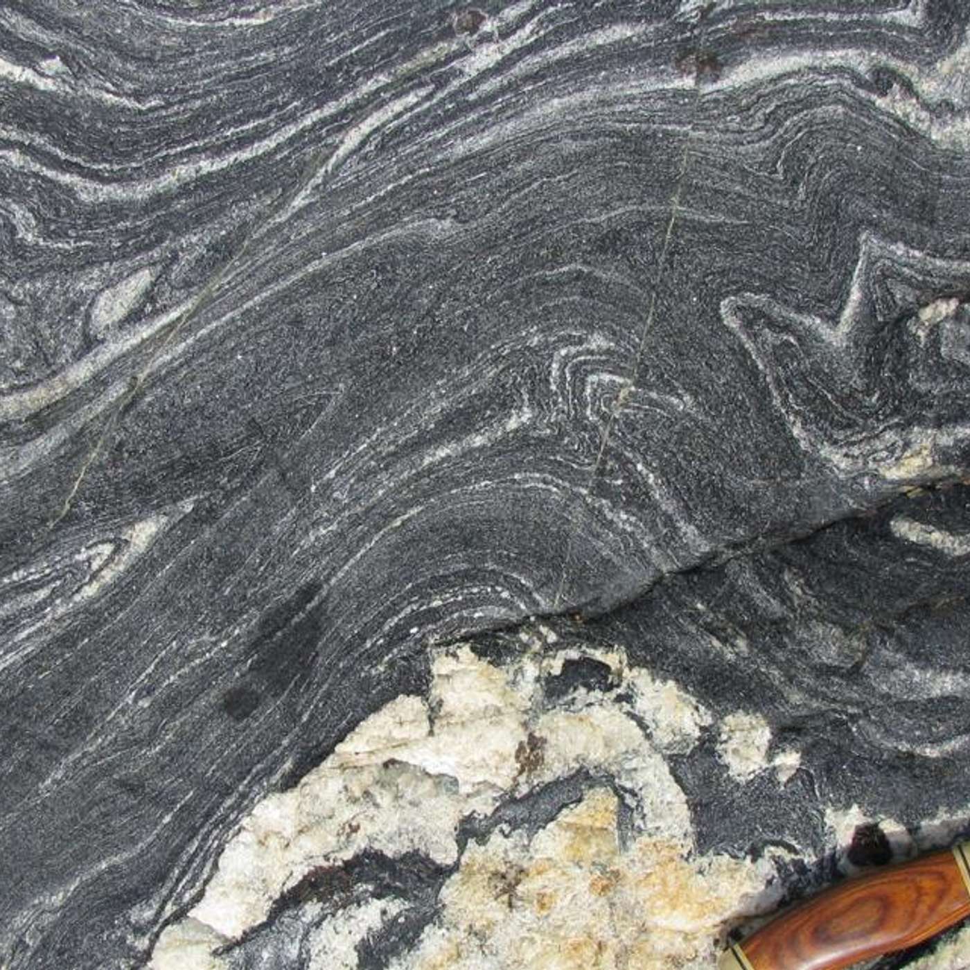 Ancient Canadian Rocks Reveal Age, NANOSPRESSO Transforms Gene Therapy, Mitochondria Defend Against Infections, Shipboard System Cuts Emissions 50 Percent, and more...