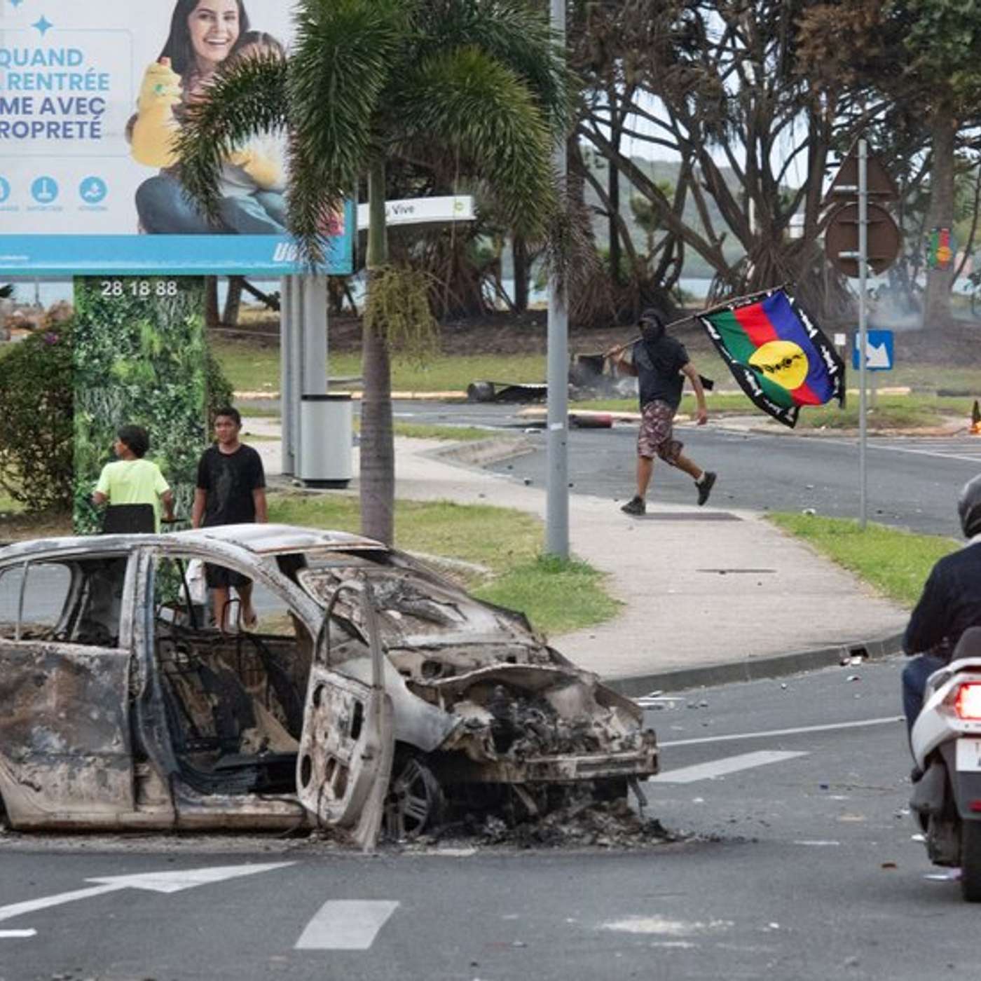 Lawrence Wong Inaugurated, Macron declares New Caledonia emergency, Zelensky Cancels Visits, Biden vs. Trump Clash, and more...