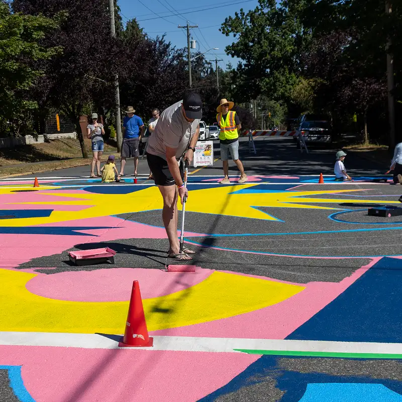Community shows up to paint mural for Old City intersection