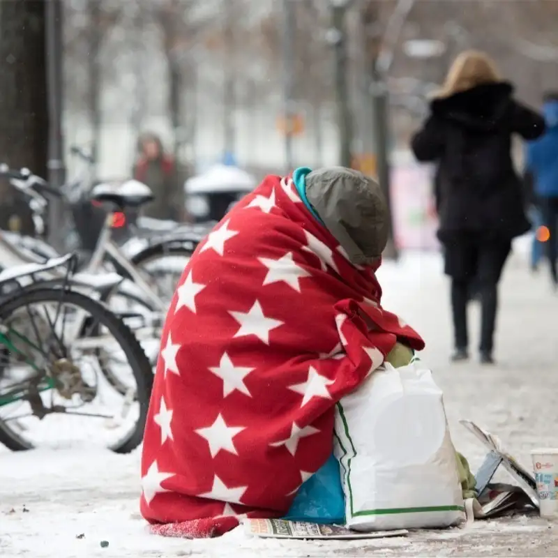 Mac talks about poverty surrounding Christmas time.